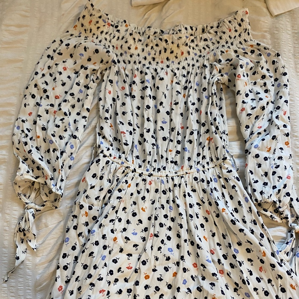 Flowery white dress.